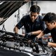 Technician working under a vehicle